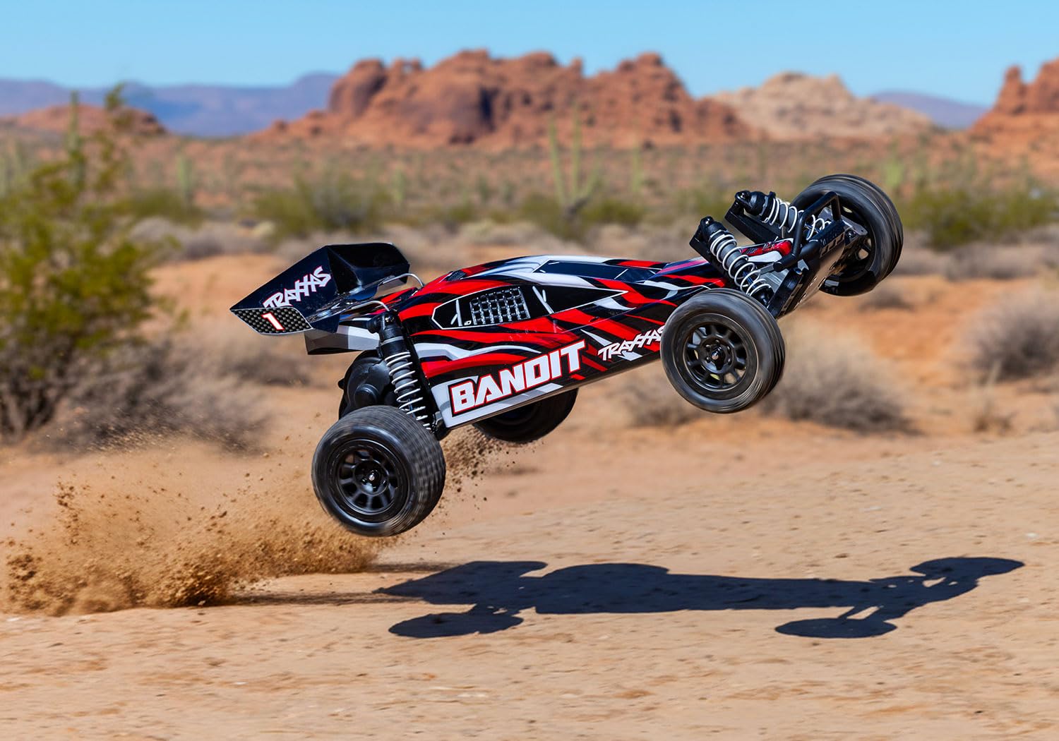 トラクサス　BANDIT ラジコンカー 防水オフロード Amazon.com: Traxxas Bandit XL-5 with Battery Red : Toys & Games